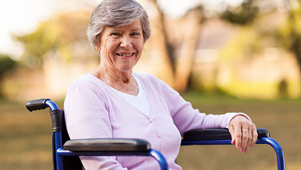Woman in wheelchair smiling